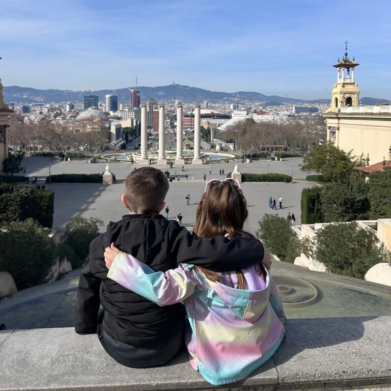 Barcelona with kids view from Montjuic hill overlooking the city