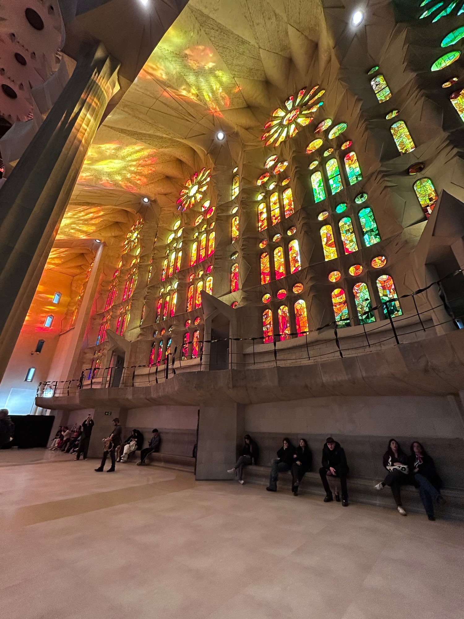 Interior of Sagrada Familia with colorful stained glass in Barcelona