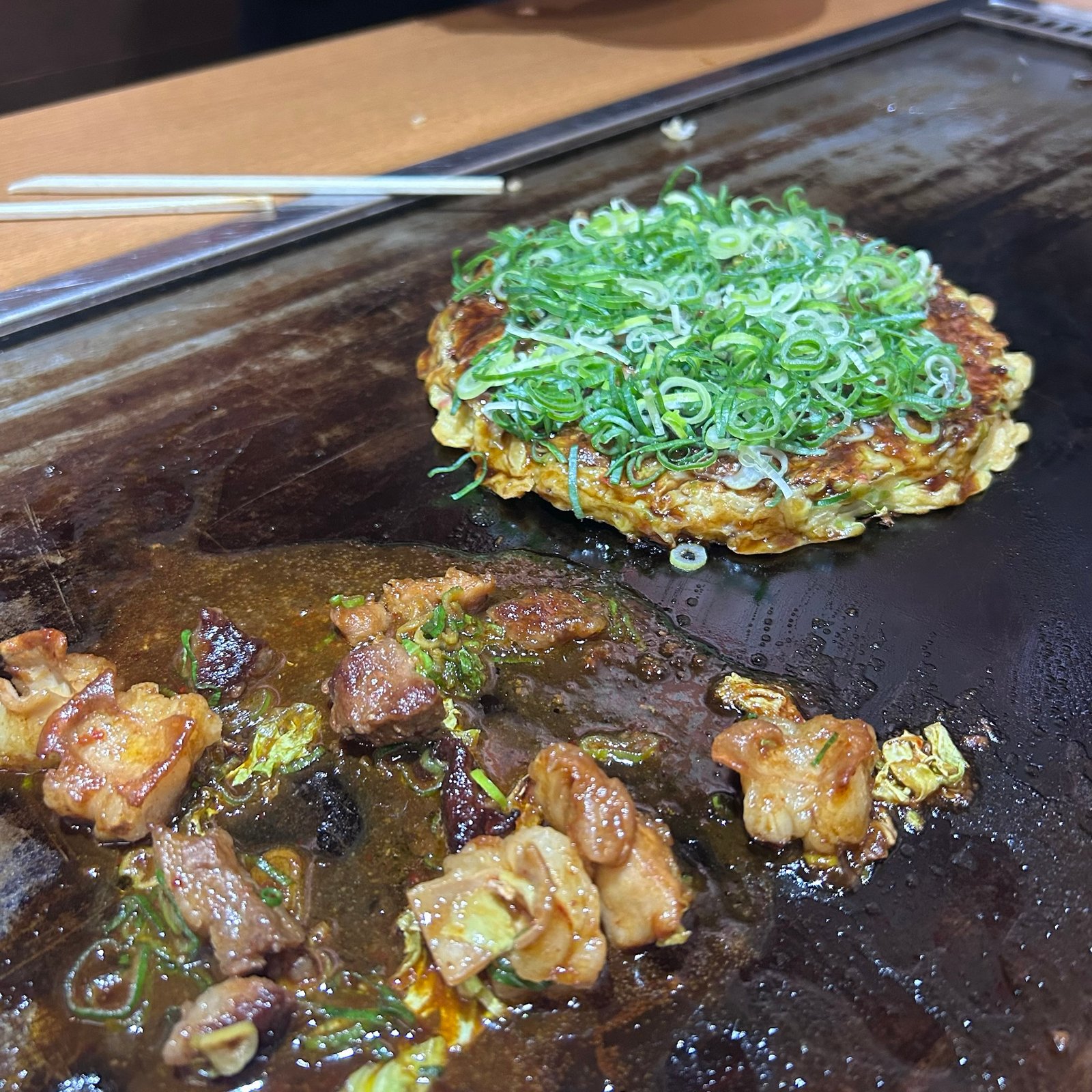 okonomiyaki japanese street food on teppan grill