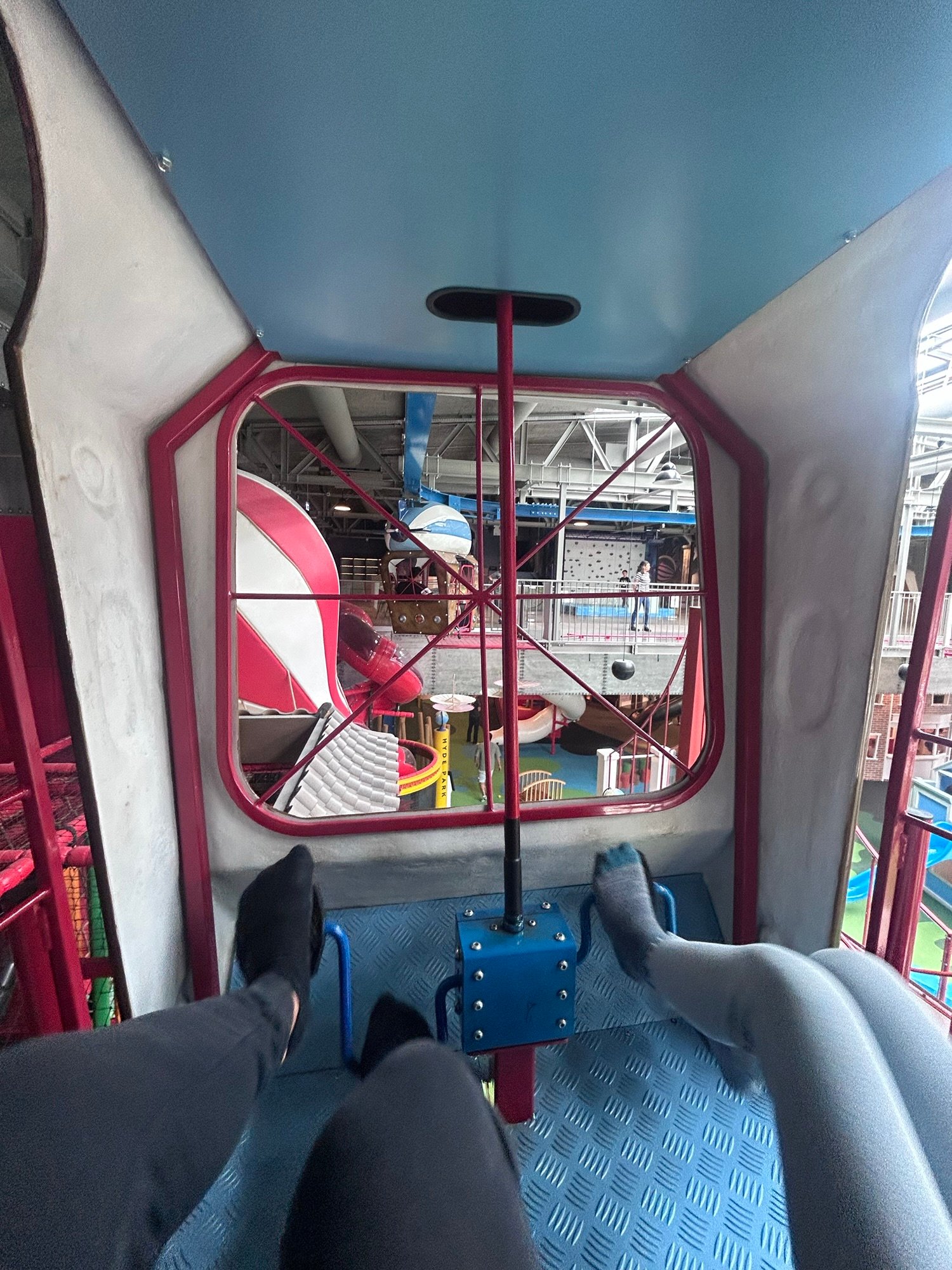 Riding the pedal-powered zeppelin inside the BalaLand Fun Park at Mövenpick BalaLand Resort, Lake Balaton.