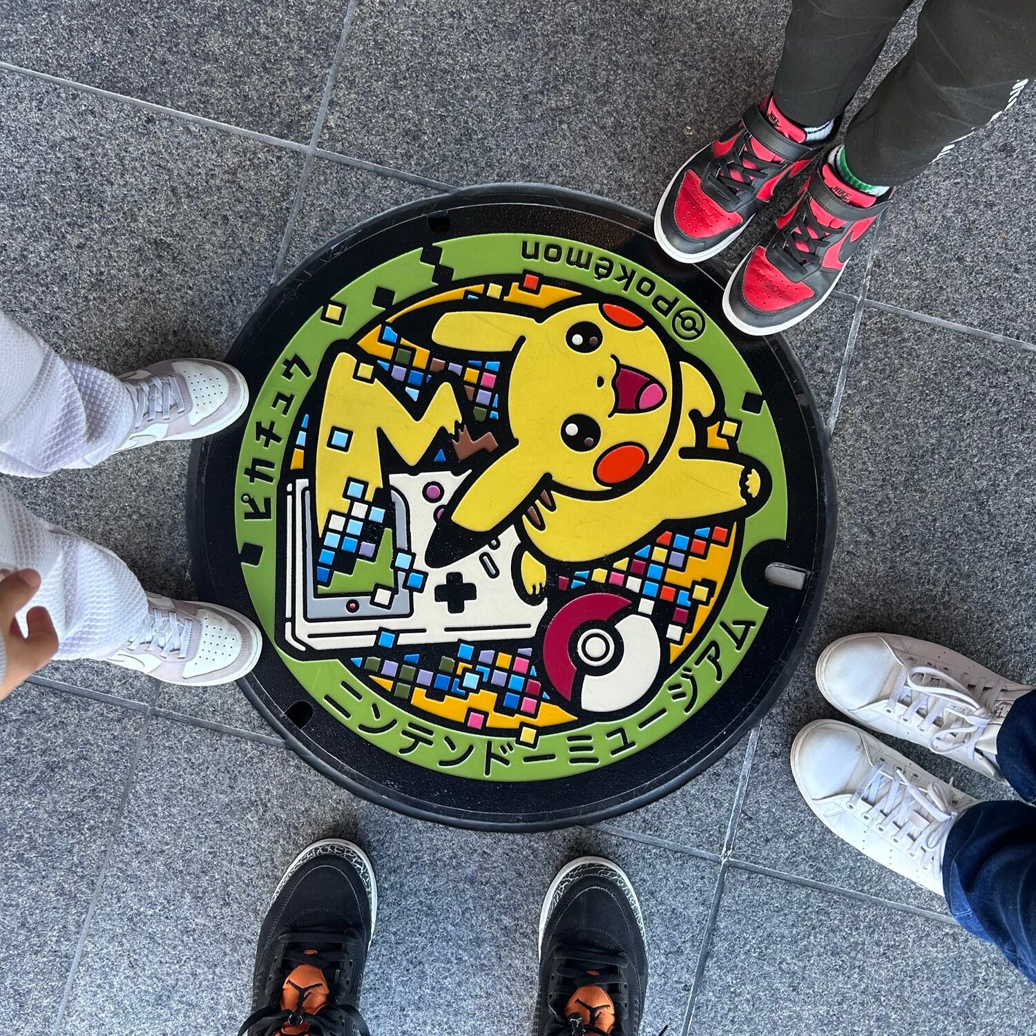 Pokemon-themed manhole cover inside the Nintendo Museum in Uji, Kyoto, Japan.
